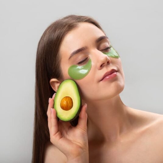 Natural Avocado shell on beautiful woman's face